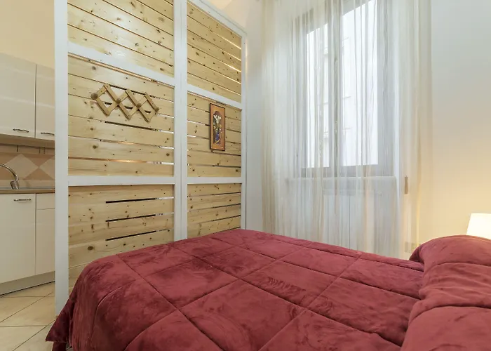 Guesthost - Vittorio Emmanuele & Colosseo Apartment Rom